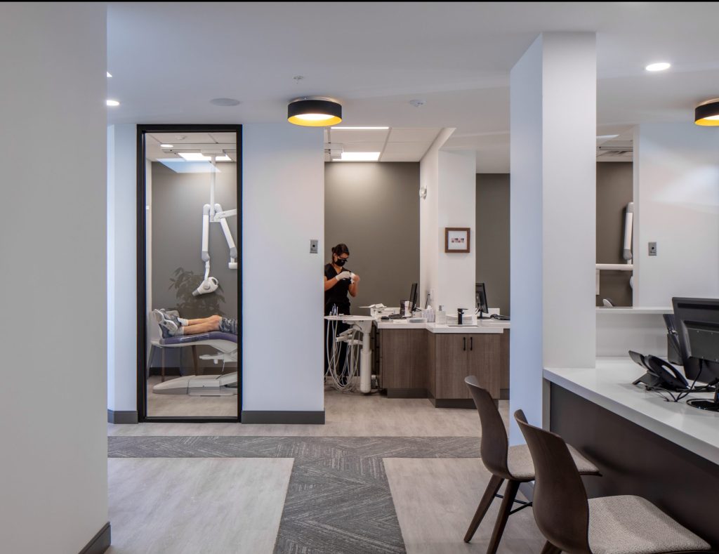 View into treatment room with side window and rear cabinetry