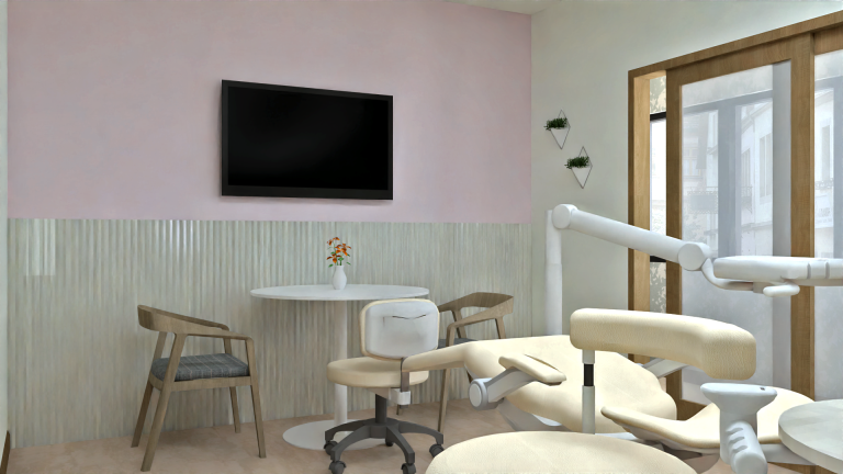 Individual treatment room with a dental chair and a consultation table with chairs